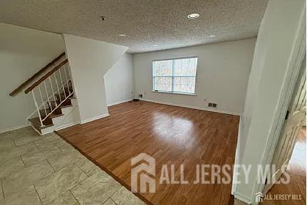 299 Prestwick Way Edison, NJ 08820 - Photo 2 of 7 a view of an empty room