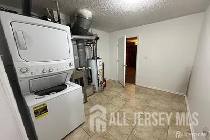 299 Prestwick Way Edison, NJ 08820 - Photo 3 of 7 a utility room with dryer and washer