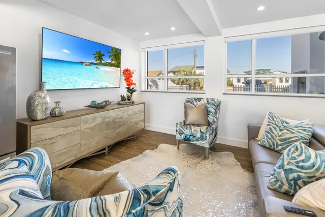 a bathroom with a double vanity sink toilet and shower