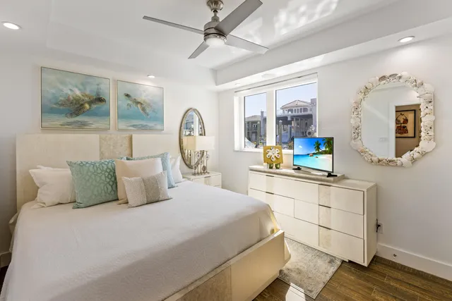 a living room with fireplace furniture and a flat screen tv