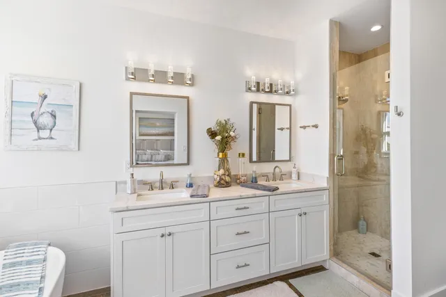 a view of storage and utility room with washer and dryer