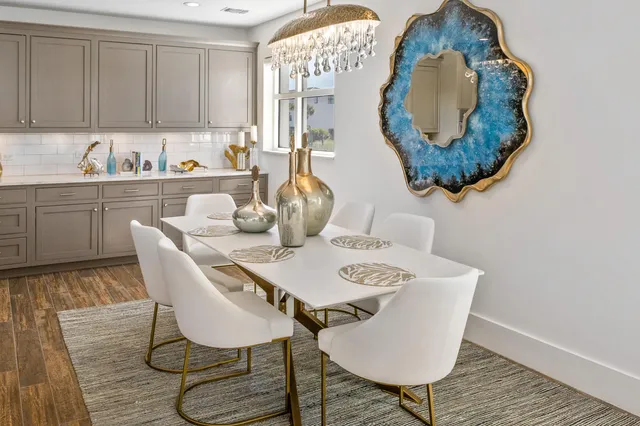 a bathroom with a bathtub and a window