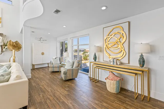 an aerial view of a house with a ocean view