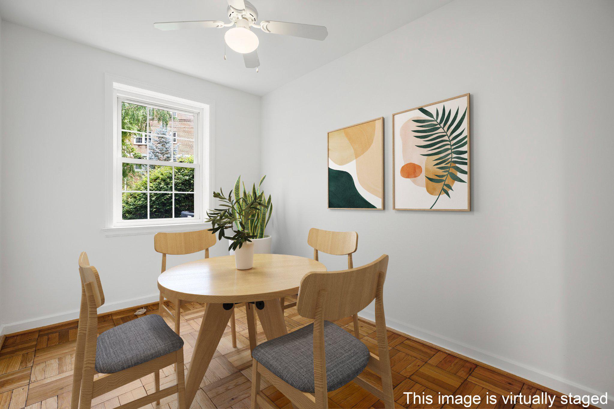 2202 Colston Drive, Unit 102 Silver Spring, MD 20910 - Photo 3 of 38 a dining room with furniture and window