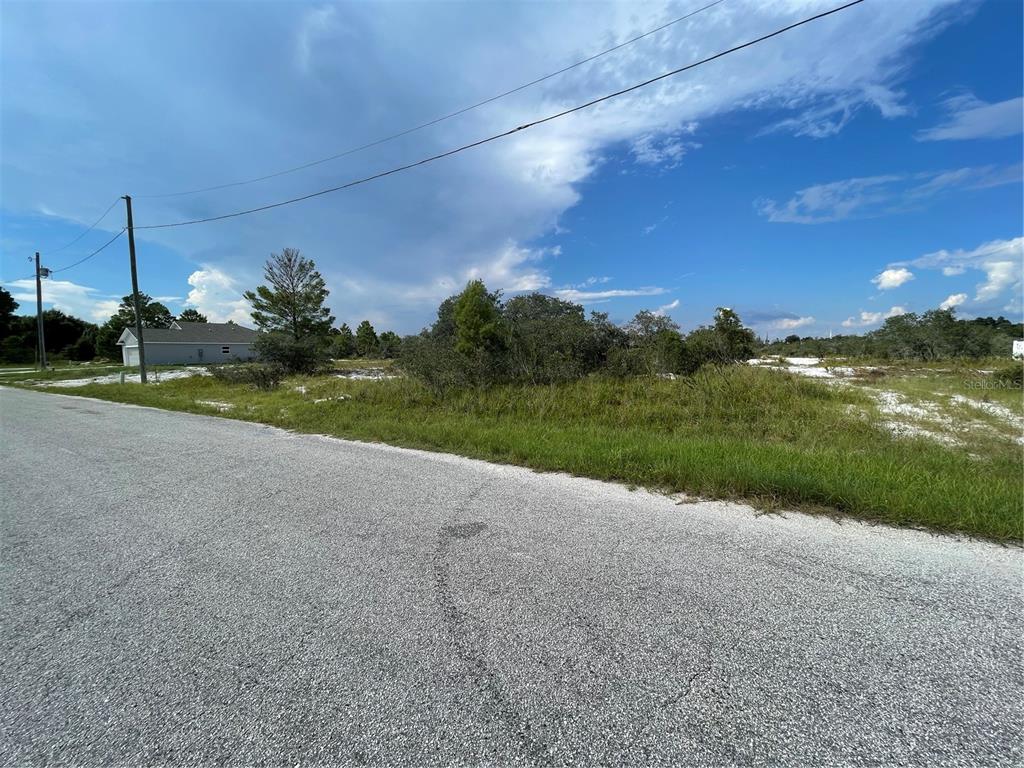 0 Joey Lane Frostproof, FL 33843 - Photo 3 of 10 a view of a big yard with a house