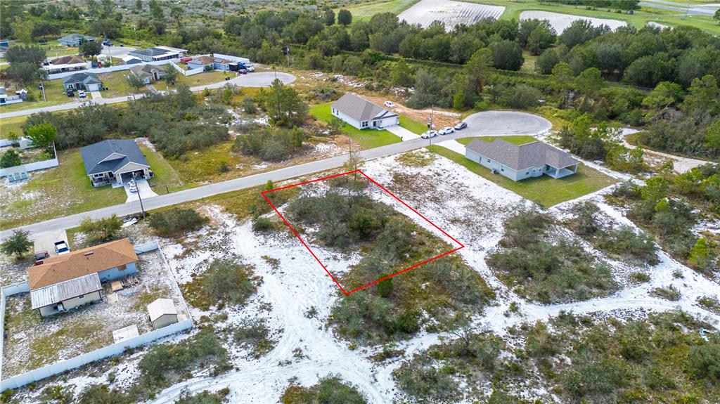 0 Joey Lane Frostproof, FL 33843 - Photo 7 of 10 an aerial view of residential houses with outdoor space
