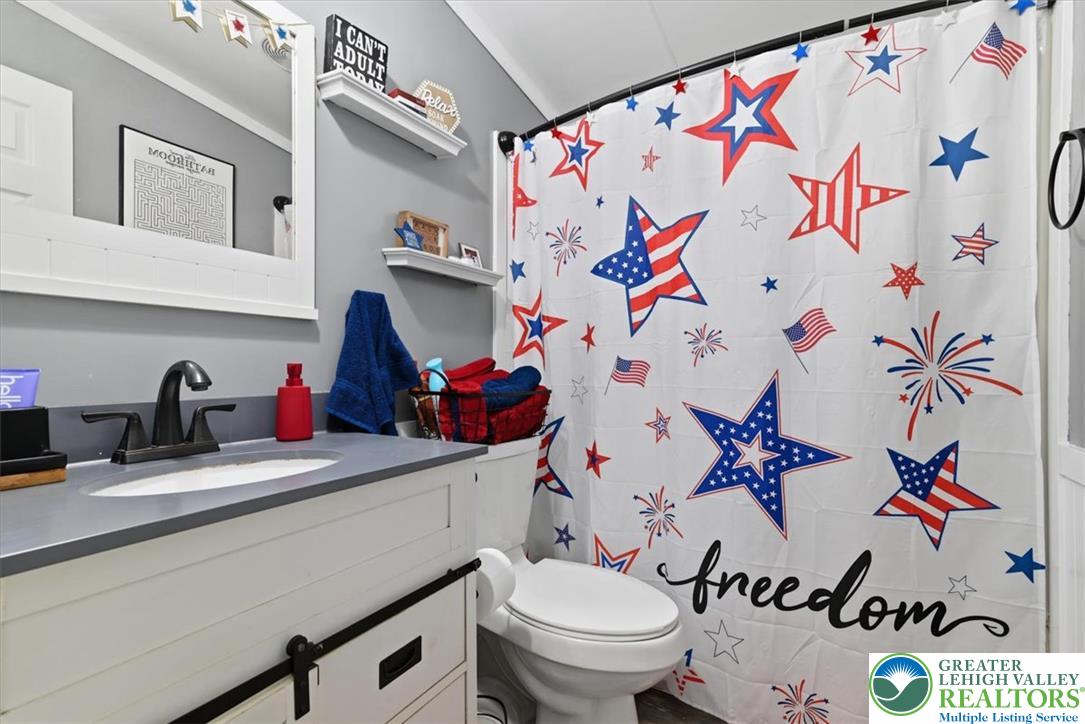 634 Main Road Lehighton, PA 18235 - Photo 33 of 39 Functional bathroom with sleek vanity and practical, accessible layout.