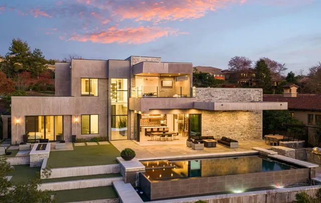 a view of a house with a swimming pool