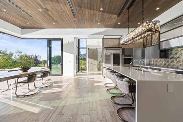 a view of a living room with a large window