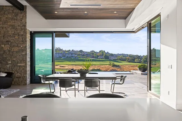 a kitchen with a sink and a stove