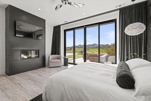 a kitchen that has a sink and a stove top oven