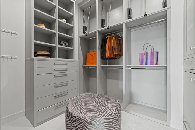 a view of a house with pool and lake view