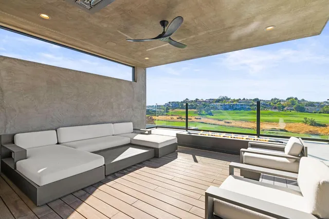 a outdoor space with patio furniture and a fireplace