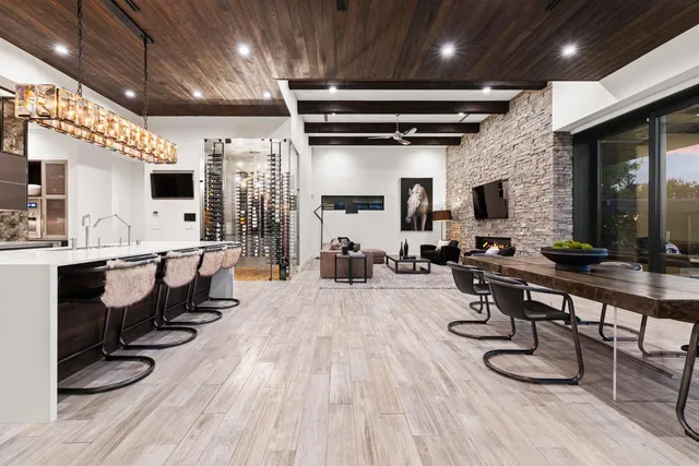 a building outdoor space with patio furniture and potted plants