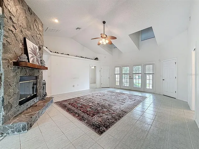 a kitchen with granite countertop cabinets and steel stainless steel appliances