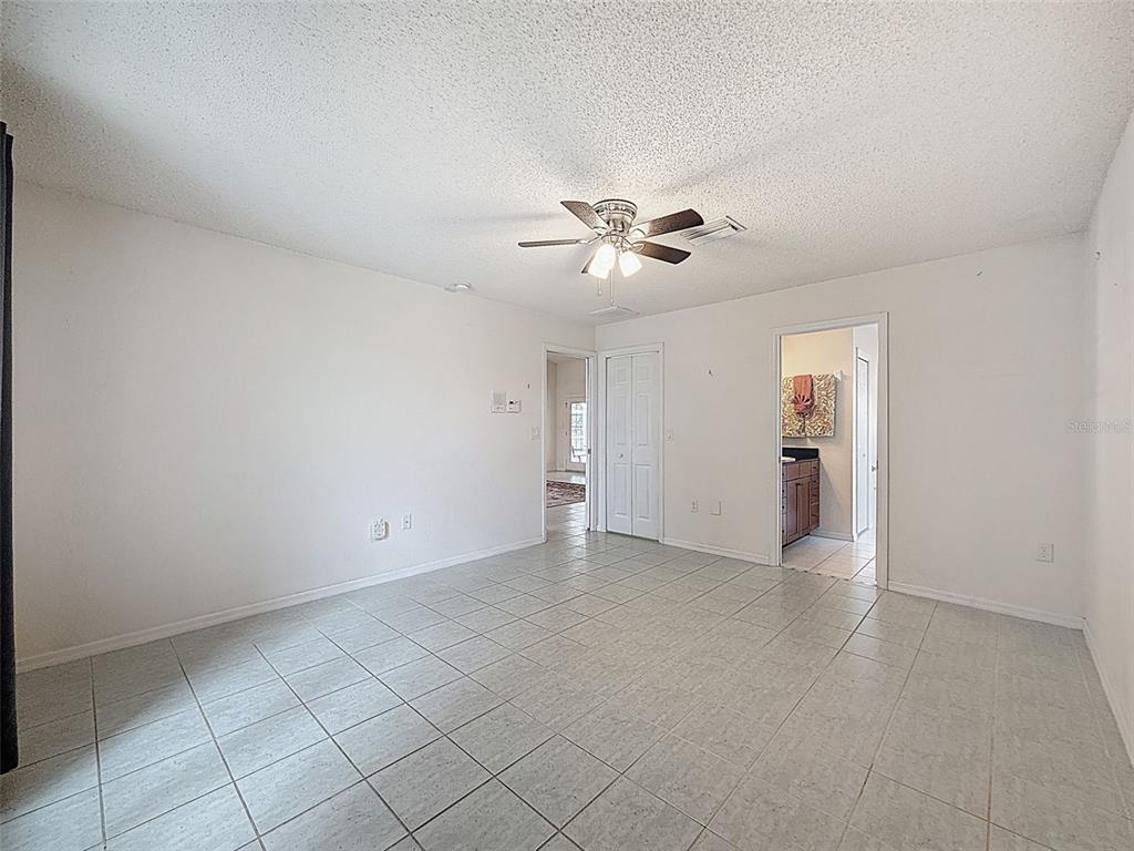 9545 Montebello Lane Spring Hill, FL 34608 - Photo 30 of 74 a view of an empty room with a window