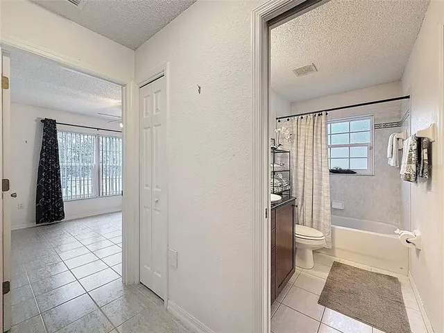 a view of a house with backyard