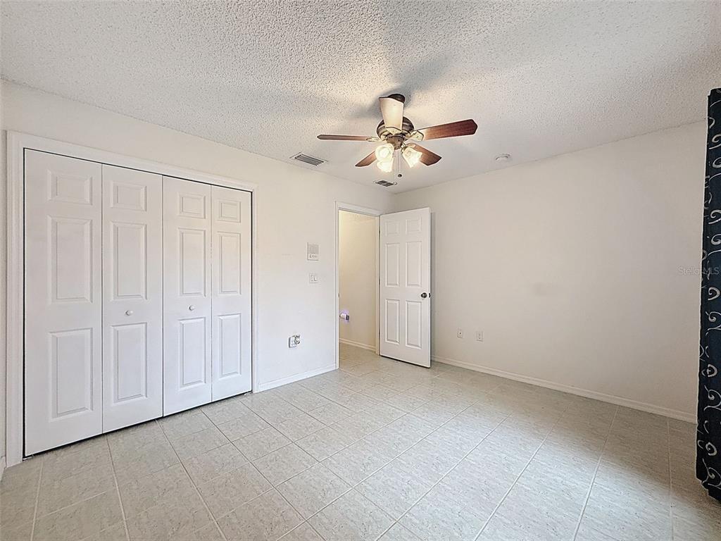 9545 Montebello Lane Spring Hill, FL 34608 - Photo 45 of 74 a view of an empty room with a window