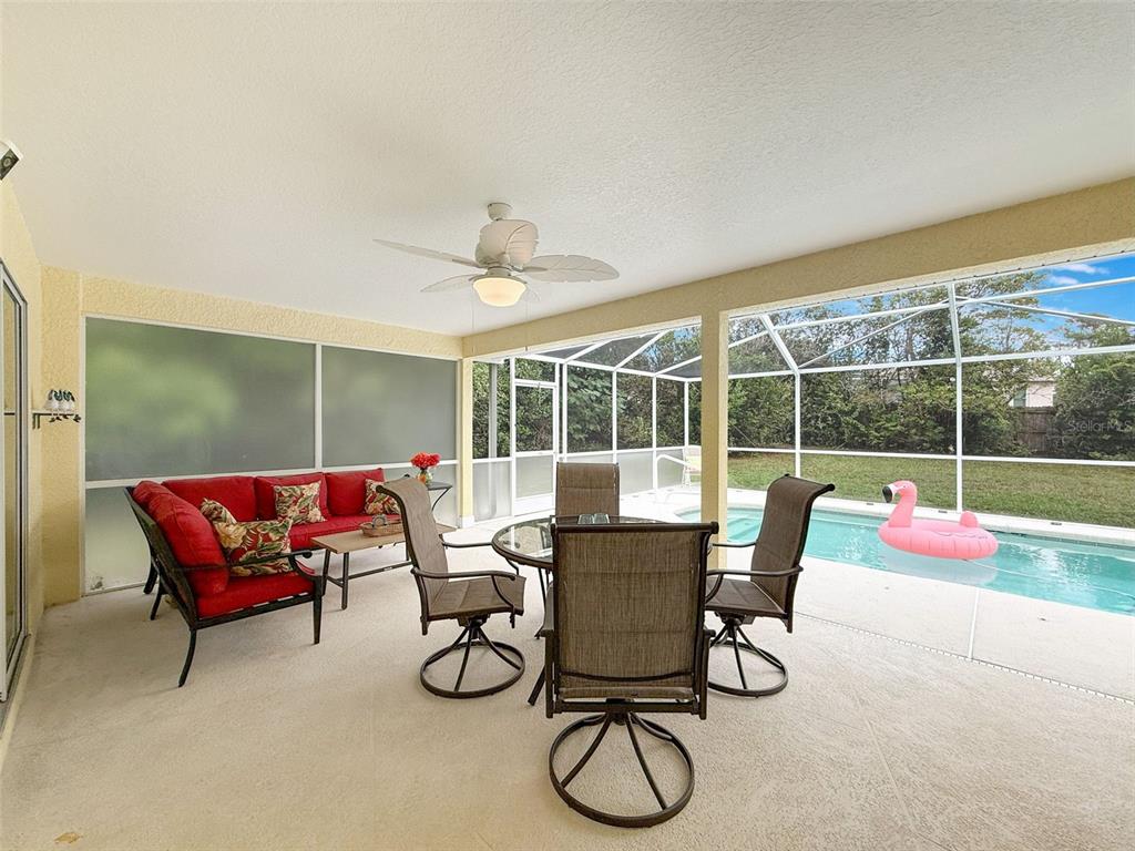 9545 Montebello Lane Spring Hill, FL 34608 - Photo 51 of 74 a outdoor space with furniture