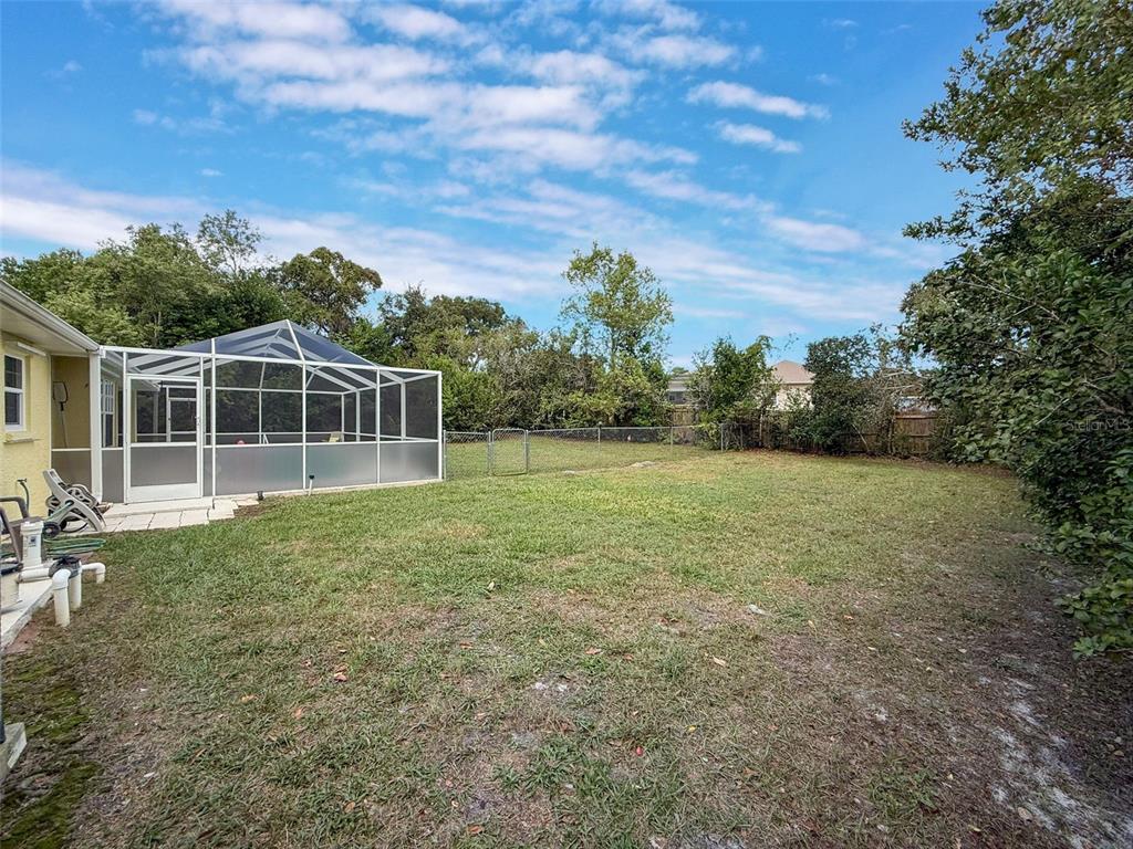 9545 Montebello Lane Spring Hill, FL 34608 - Photo 62 of 74 a view of a house with backyard