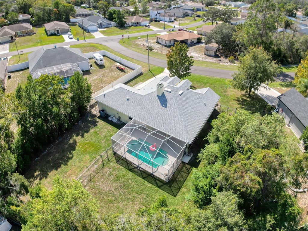 9545 Montebello Lane Spring Hill, FL 34608 - Photo 67 of 74 an aerial view of a house with a garden