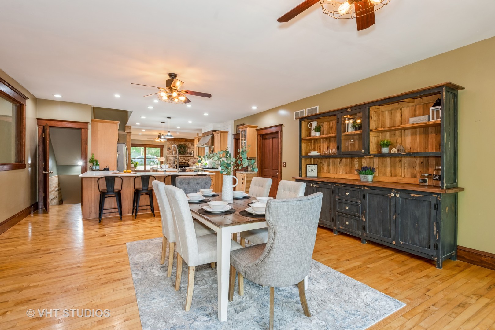 708 Riedy Road Lisle, IL 60532 - Photo 11 of 25 a dining room with furniture and wooden floor