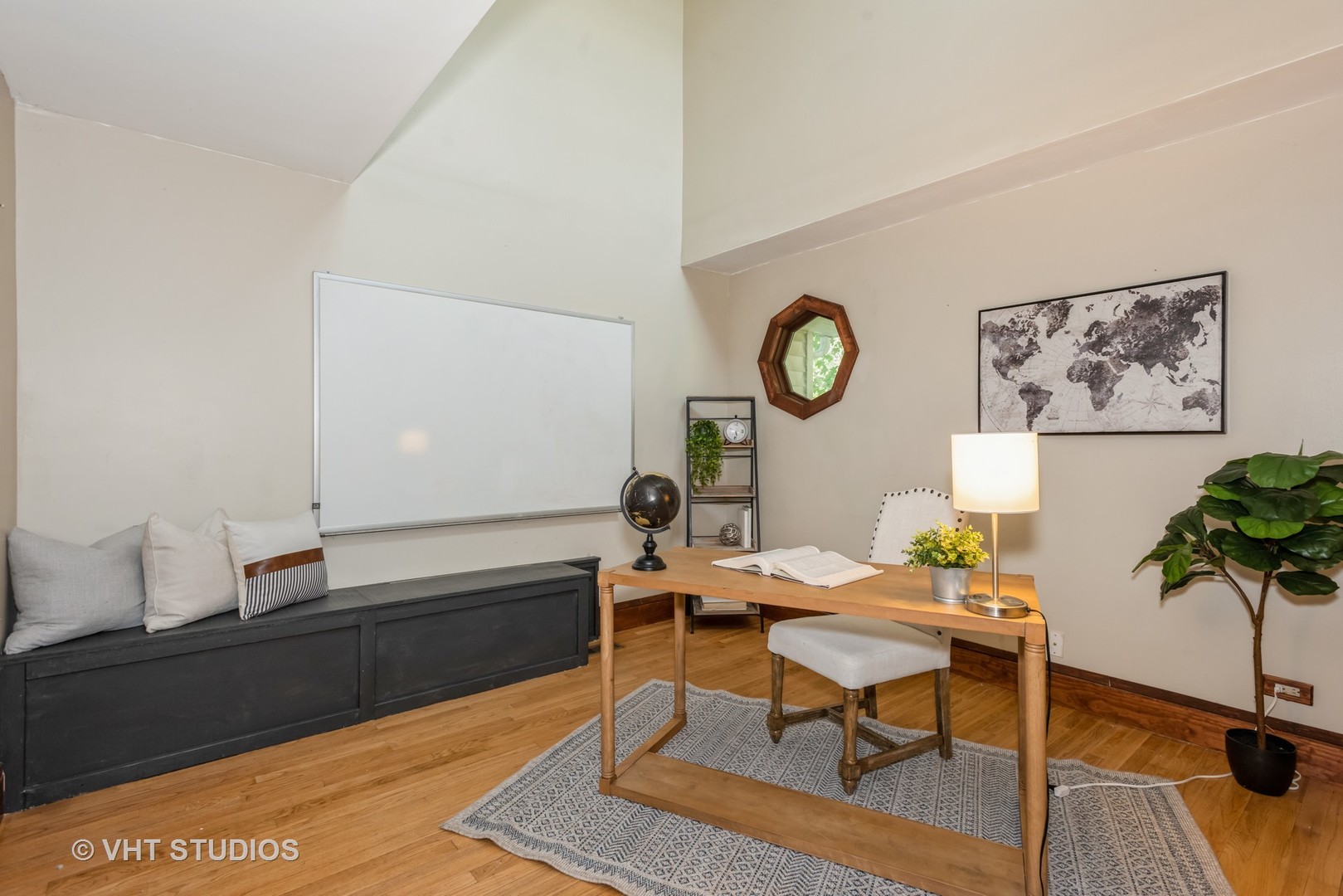708 Riedy Road Lisle, IL 60532 - Photo 12 of 25 a living room with furniture and a clock