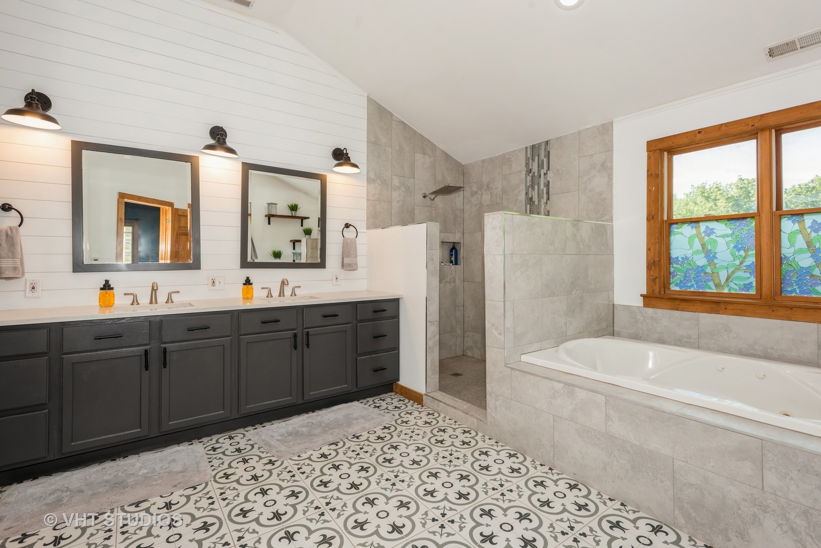 708 Riedy Road Lisle, IL 60532 - Photo 19 of 25 a spacious bathroom with a tub sink and mirror