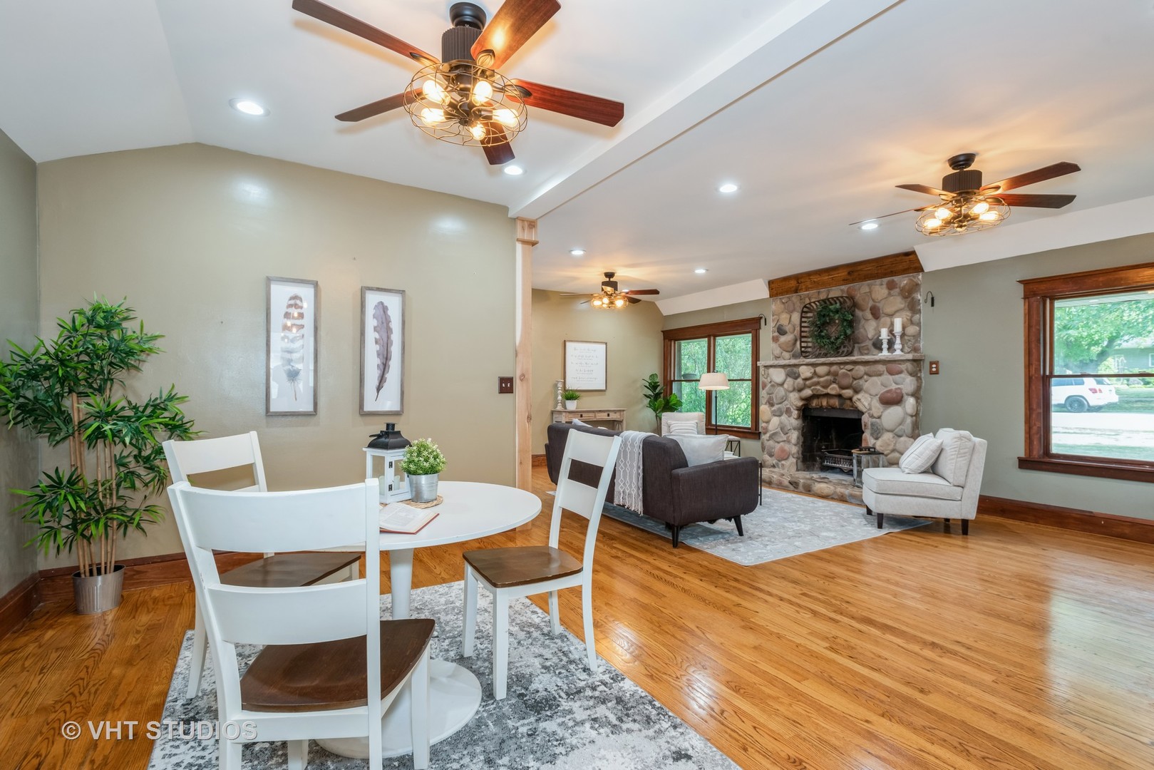 708 Riedy Road Lisle, IL 60532 - Photo 6 of 25 a living room with fireplace furniture and a wooden floor