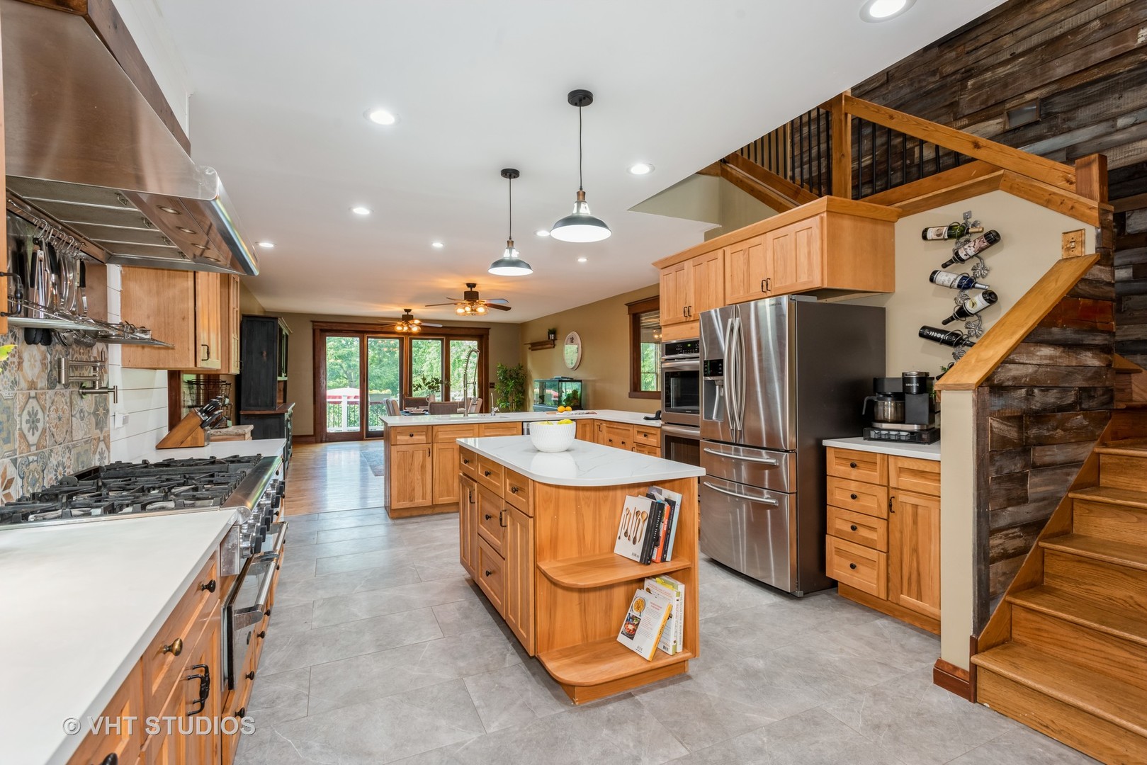708 Riedy Road Lisle, IL 60532 - Photo 9 of 25 a kitchen with stainless steel appliances granite countertop a stove and a refrigerator