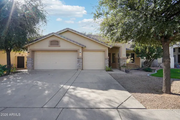 a view of garage and yard