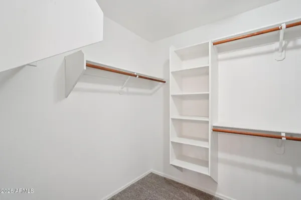 a bathroom with a bathtub a sink and a mirror