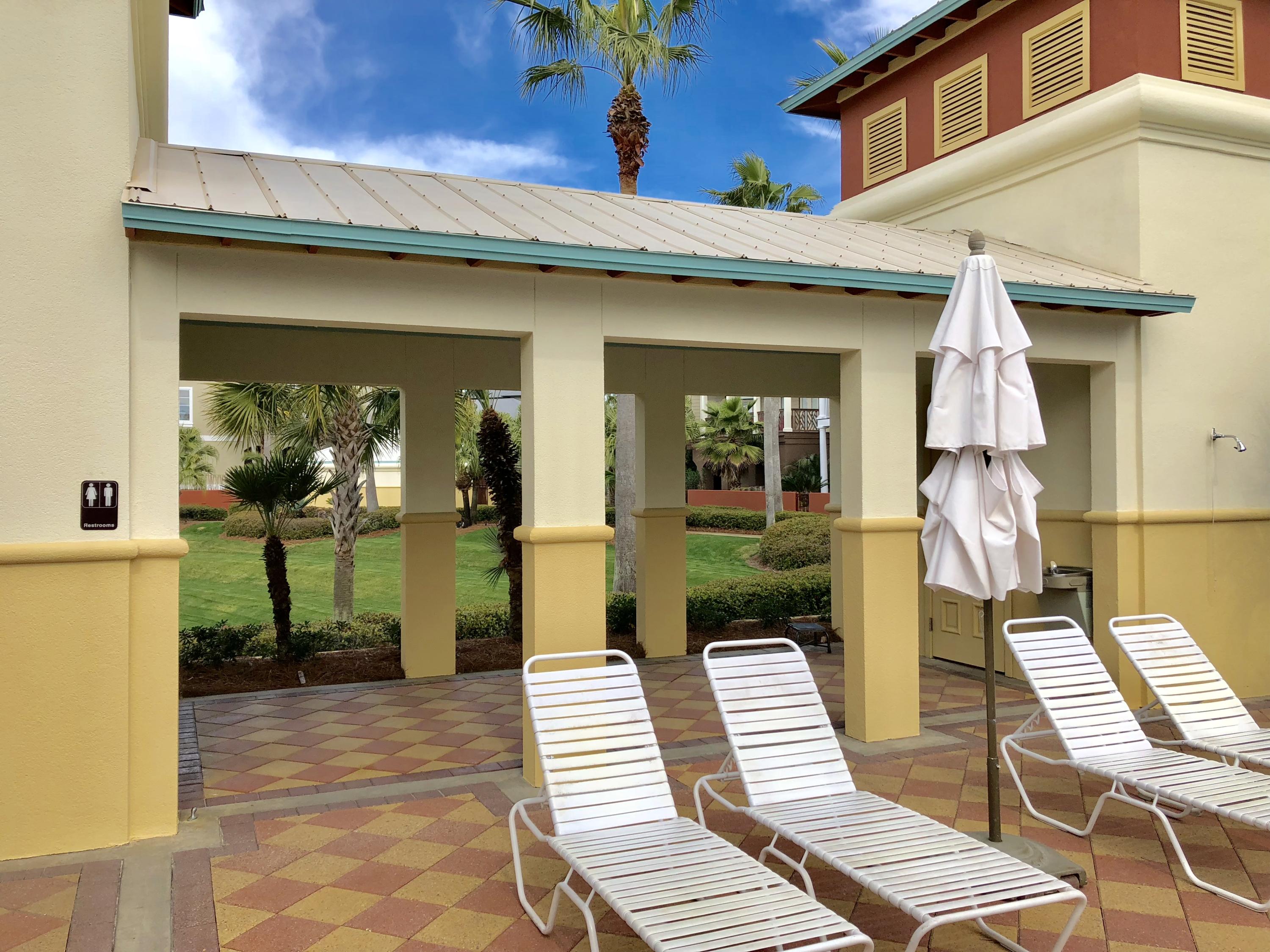 Lot 11 Lifeguard Loop Seacrest, FL 32461 - Photo 12 of 22 a front view of a house with a chairs and table