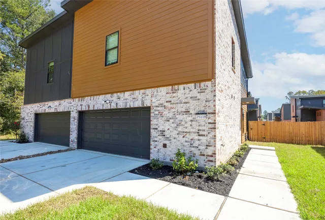 a front view of a house with yard