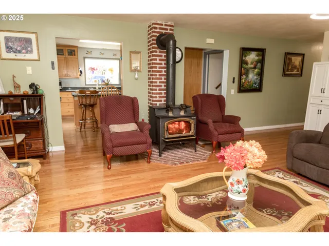 a living room with furniture and a table