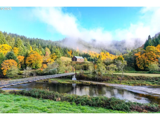 a view of a back yard with a wooden fence