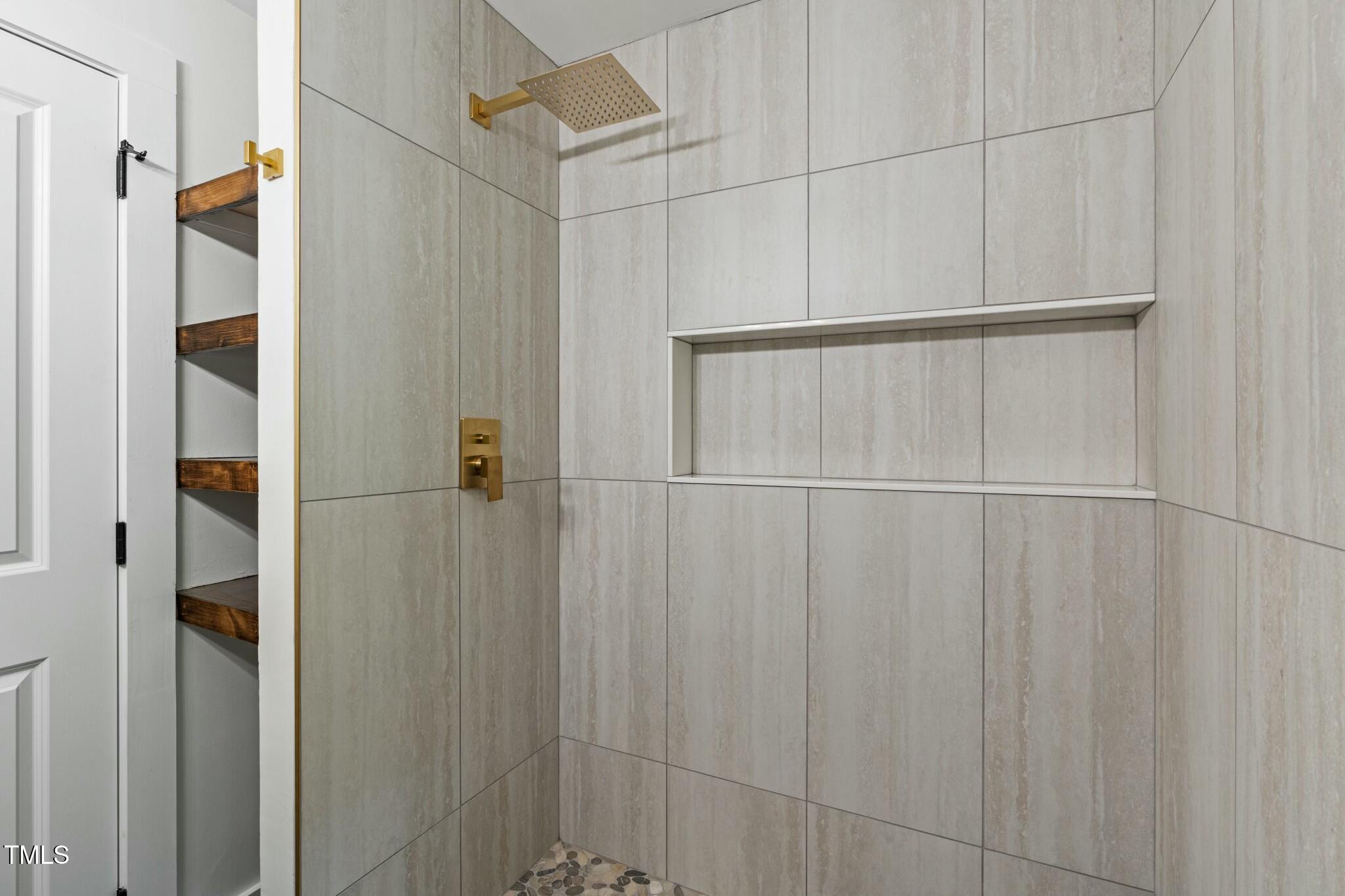 6421 Arrington Road Raleigh, NC 27607 - Photo 13 of 31 a bathroom with a shower