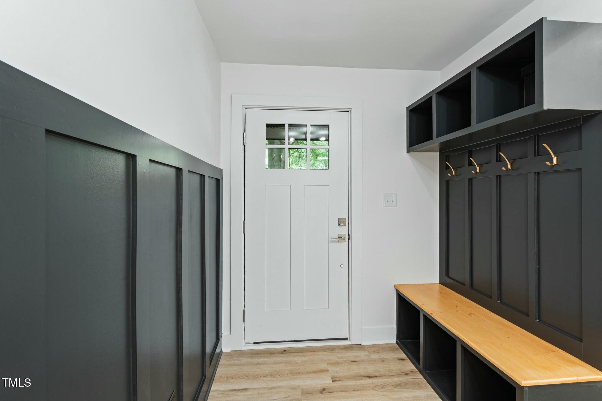 6421 Arrington Road Raleigh, NC 27607 - Photo 6 of 31 a view of hallway with stairs