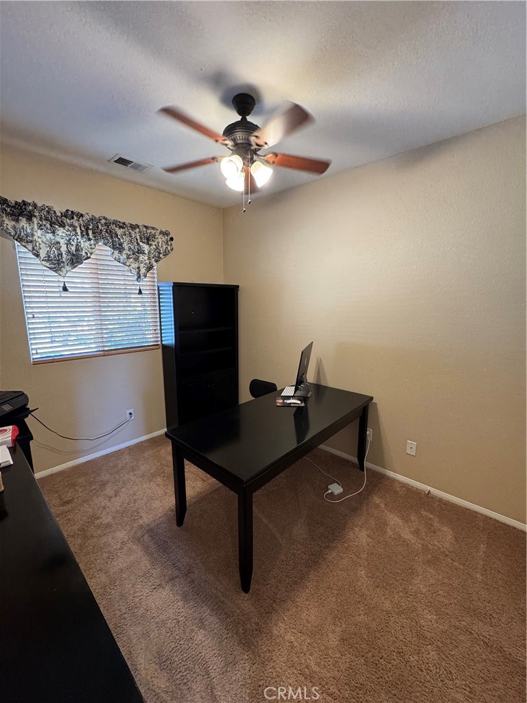 12203 Appian Drive Rancho Cucamonga, CA 91739 - Photo 15 of 20 a view of a workspace with furniture