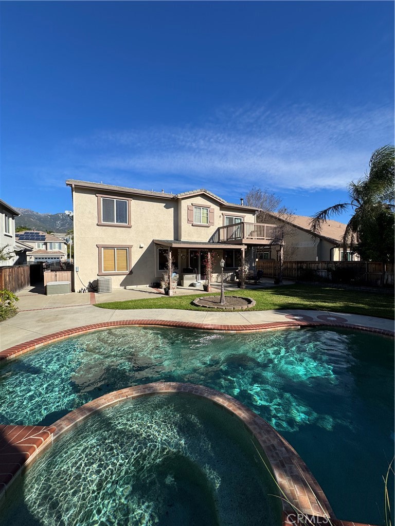 12203 Appian Drive Rancho Cucamonga, CA 91739 - Photo 19 of 20 a front view of a house with a garden