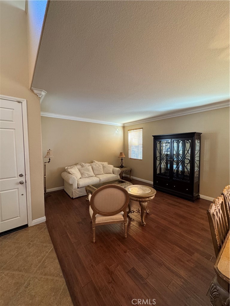 12203 Appian Drive Rancho Cucamonga, CA 91739 - Photo 3 of 20 a living room with furniture and window