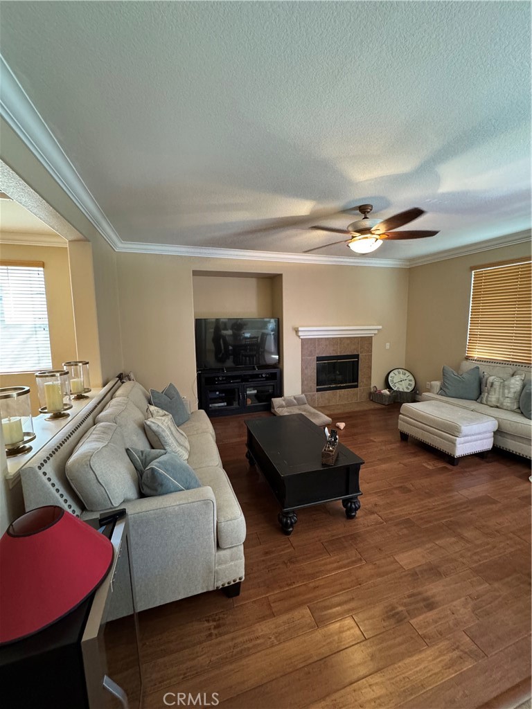 12203 Appian Drive Rancho Cucamonga, CA 91739 - Photo 7 of 20 a living room with furniture and a fireplace