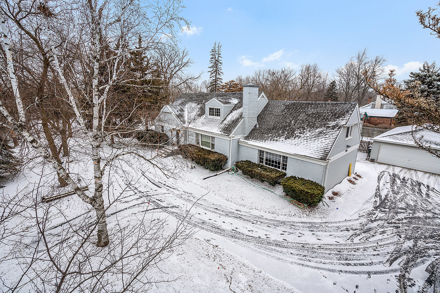 3220 Techny Road Northbrook, IL 60062 - Photo 1 of 37 a view of a house with a snow in a yard