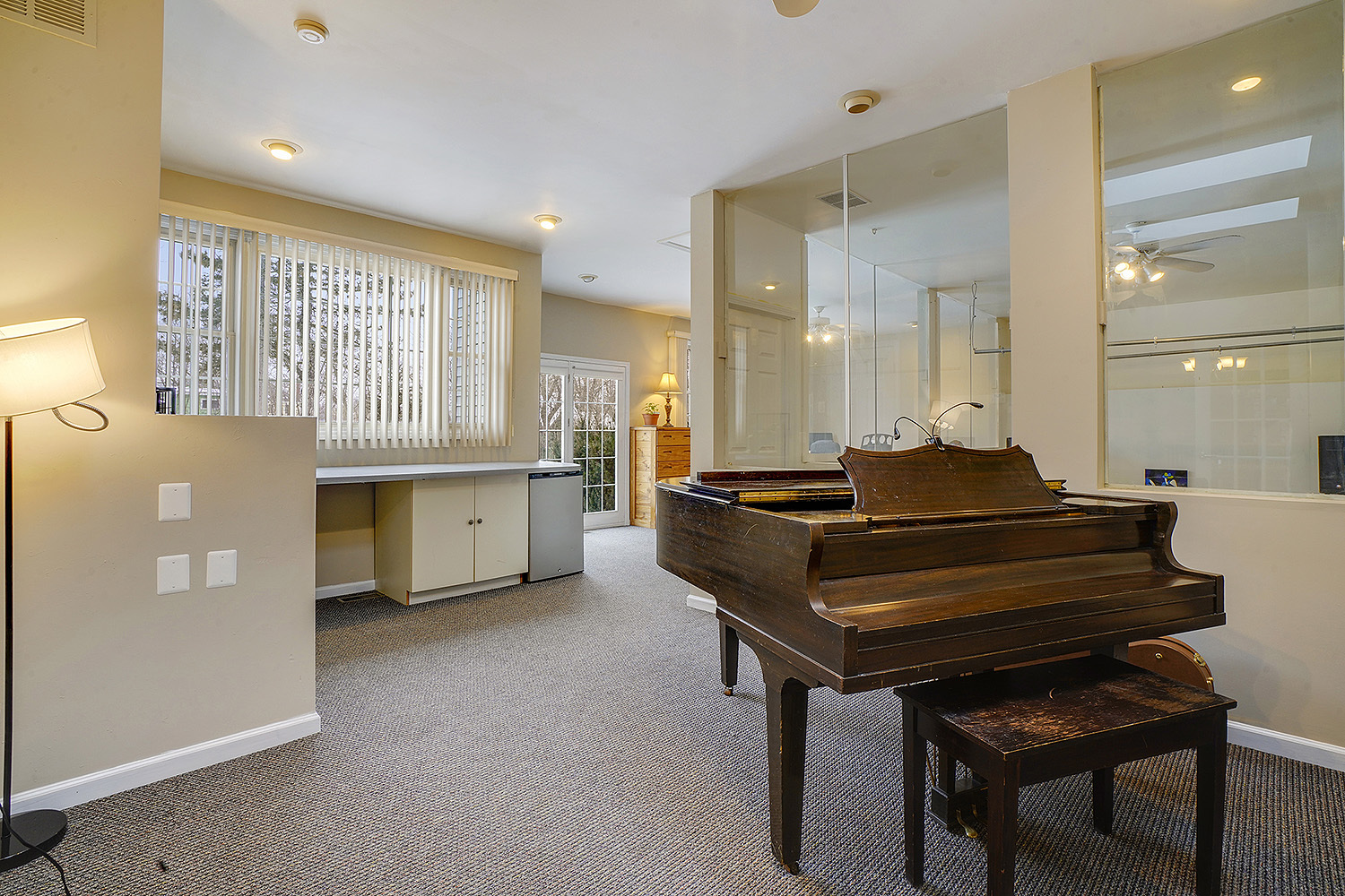 3220 Techny Road Northbrook, IL 60062 - Photo 12 of 37 a living room with a table chairs and a kitchen view