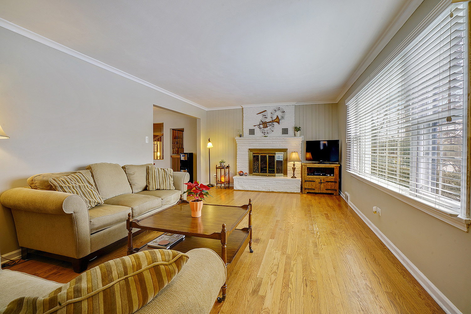 3220 Techny Road Northbrook, IL 60062 - Photo 3 of 37 a living room with furniture large window and a fireplace