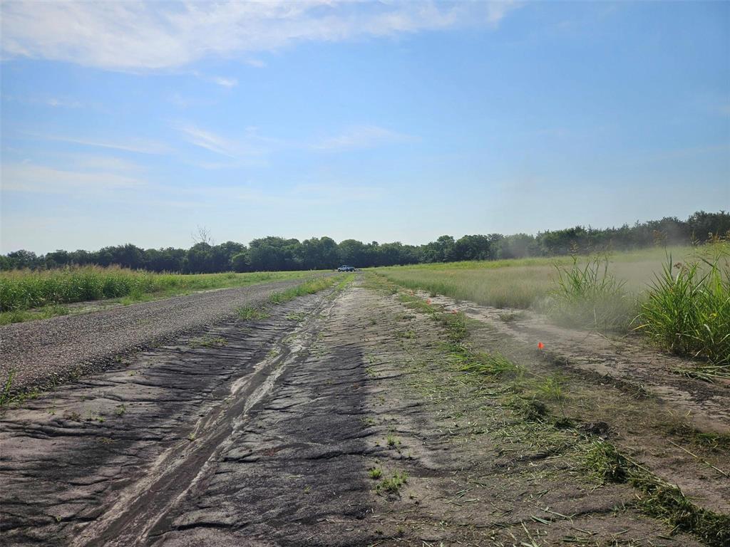 0 Hayfield Court Paris, TX 75460 - Photo 5 of 26 a view of a lake with mountain in the background