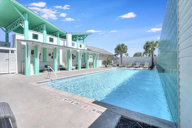 a view of a brick house with a large windows