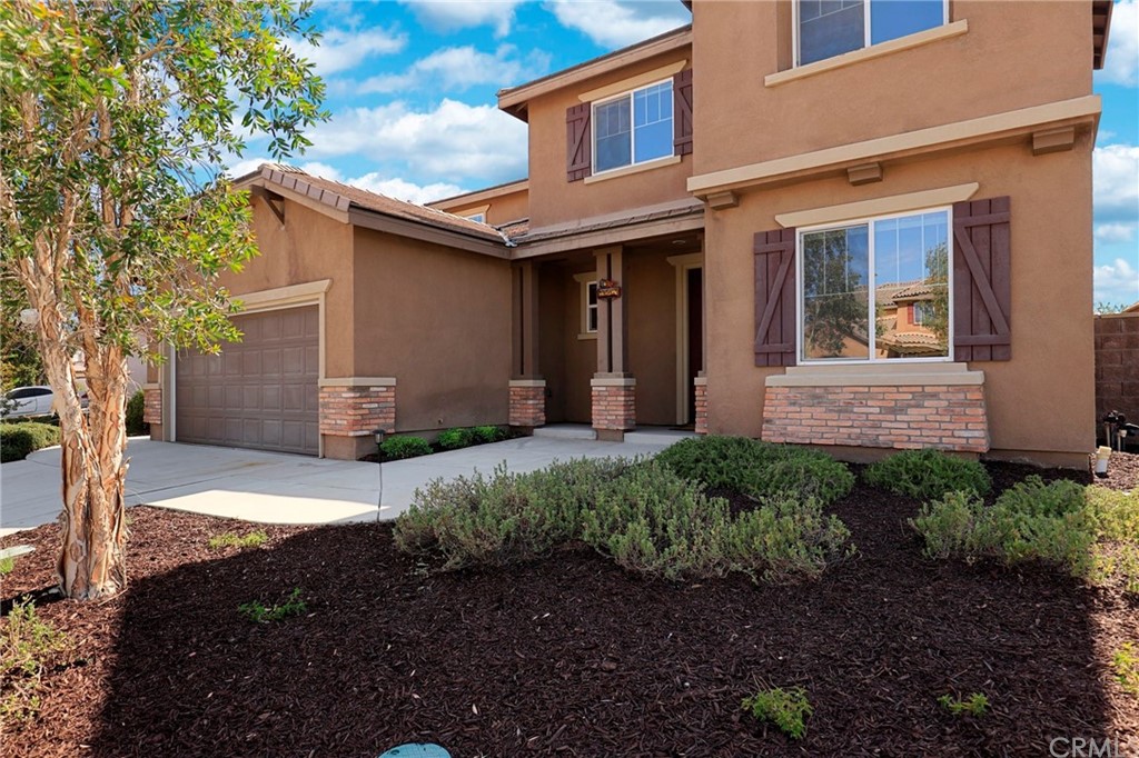29309 First Green Lake Elsinore, CA 92530 - Photo 2 of 59 a view of a house with a yard