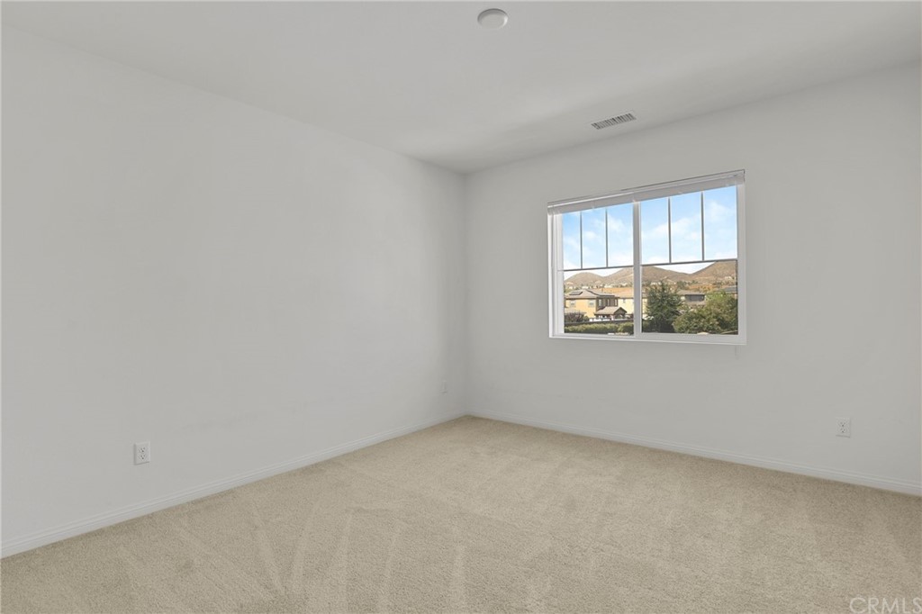 29309 First Green Lake Elsinore, CA 92530 - Photo 25 of 59 an empty room with a window