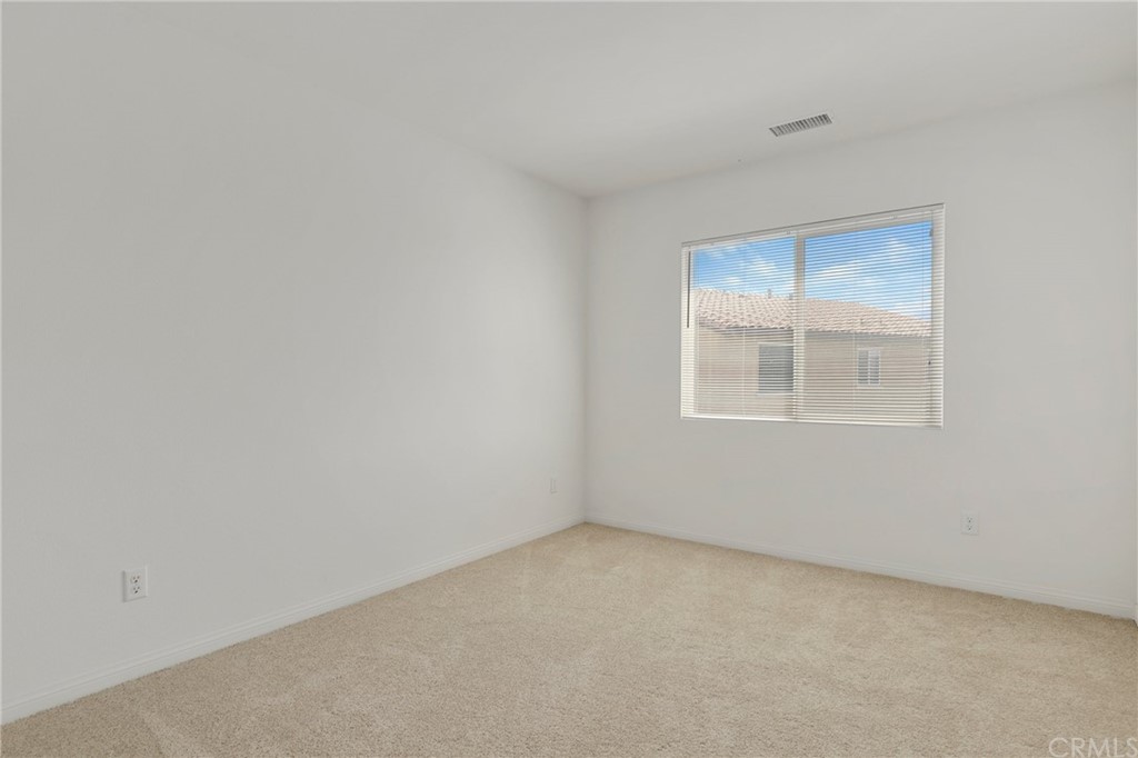 29309 First Green Lake Elsinore, CA 92530 - Photo 31 of 59 a view of an empty room with a window